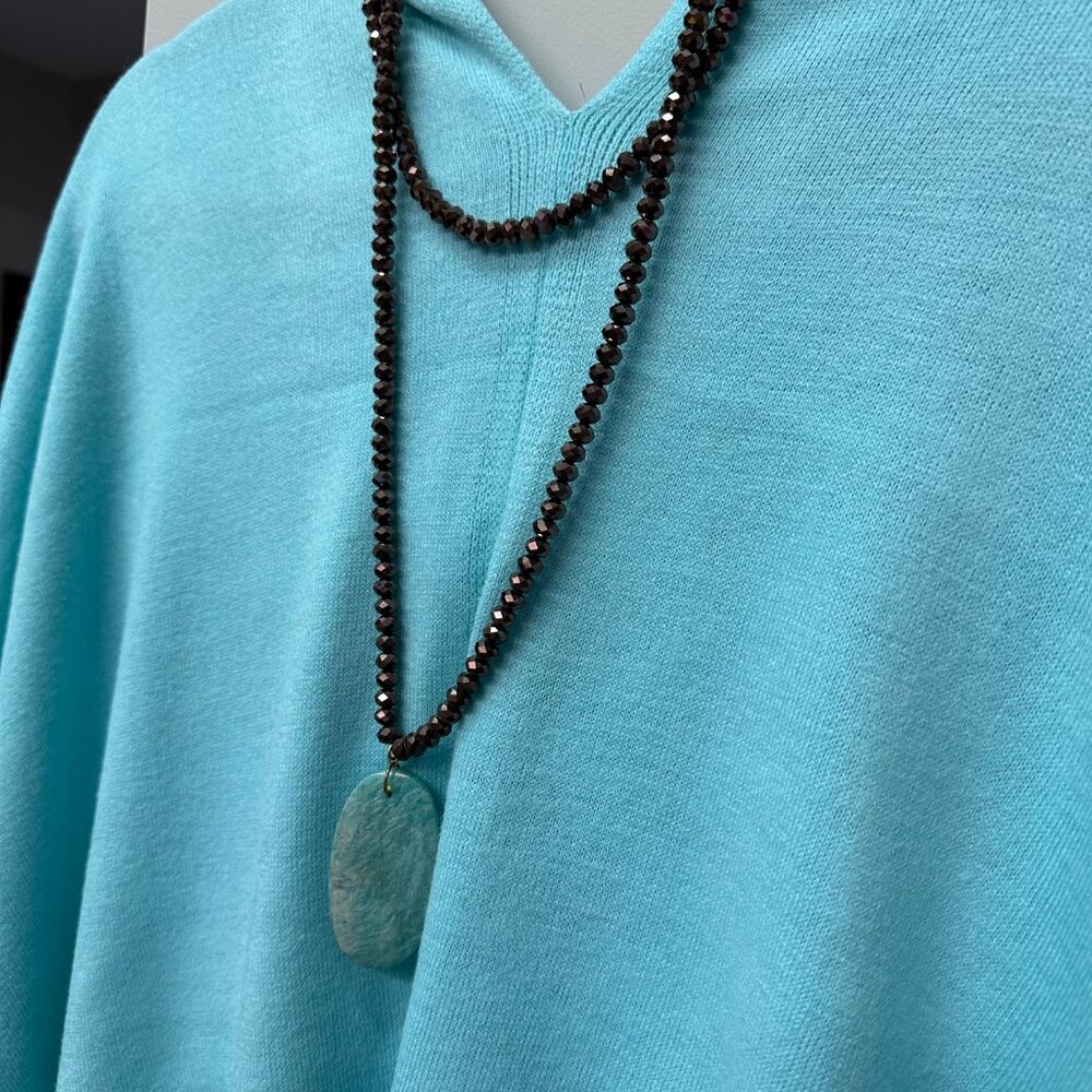 Fabulina brand multi strand bronze colored glass faceted bead necklace.